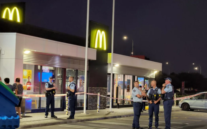 A man was involved in a violent attack on his wife at McDonald's, with police present at the scene.