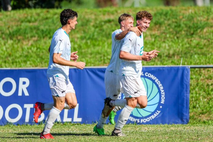 Luke Supyk, a New Zealander, celebrated a goal with his teammates at the OFC Men's U-19 Championship 2024.