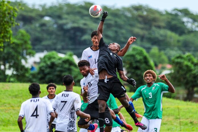 Gideon Abidan makes a save.