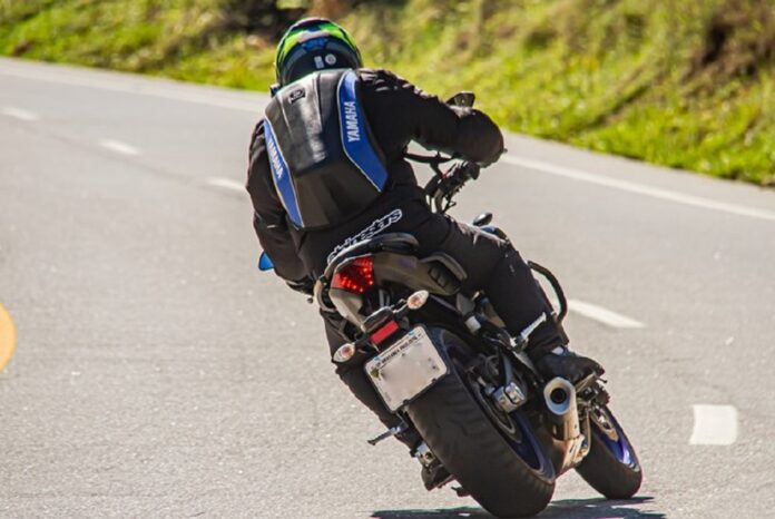 A motorcyclist died in a crash while a person with critical injuries was discovered on an Auckland road