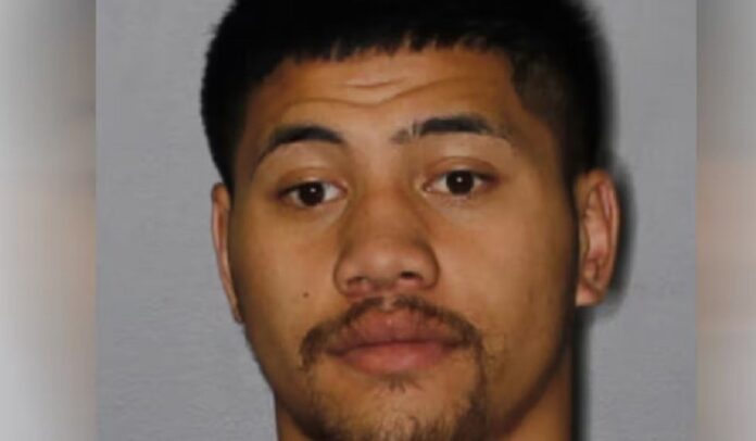 An Auckland man has escaped custody, and a warrant for his arrest has been issued